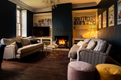The drawing room is warm and cosy
